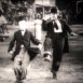 Laurel et Hardy chantent et dansent